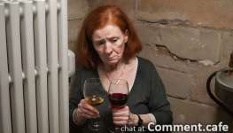 an-image-of-an-elderly-red-head-with-a-glass-of-wi-upscaled (3).jpg